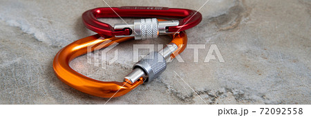 Screw gate carabiners on a marble top Screw gate carabiners on a marble top 72092558