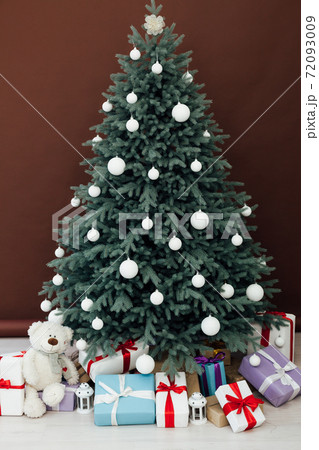 decor new year and terrier beautiful Christmas tree with gifts 72093009