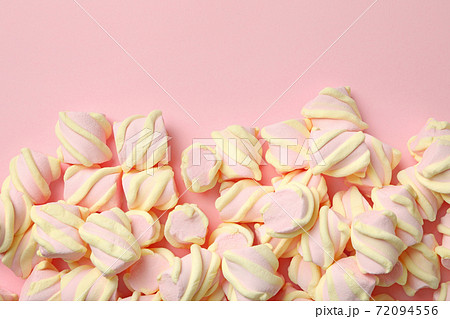 Sweet marshmallow on pink background, space for text 72094556