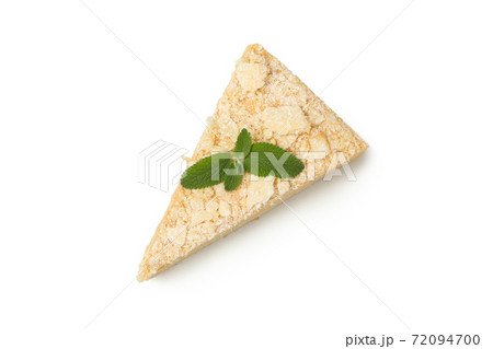 Piece of Napoleon cake with mint isolated on white background Piece of Napoleon cake with mint isolated on white background 72094700