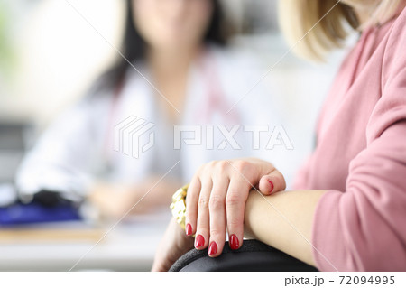 Hands of doctor and patient in medical office. Hands of doctor and patient in medical office. 72094995
