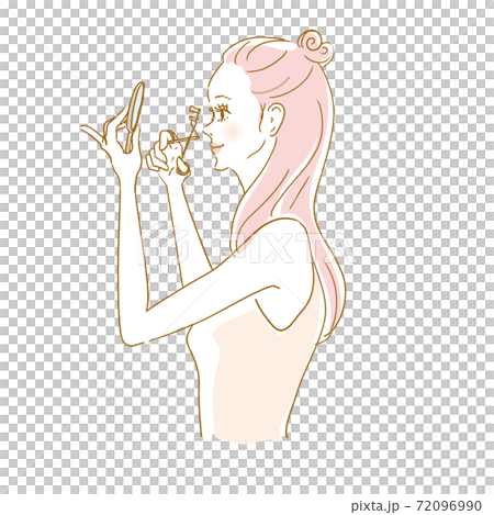 Female eyelash curler during makeup 72096990