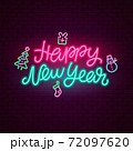 Happy New Year neon lettering slogan on brick wall 72097620