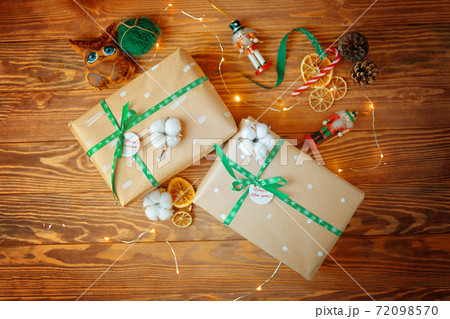 Gift box on wooden table. 72098570