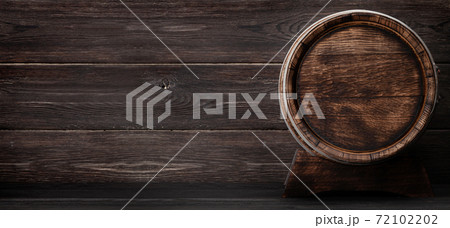 Old wooden barrel for wine or whiskey aging 72102202