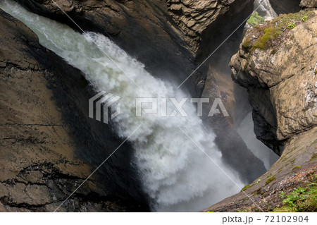 View closeup waterfall of Trmmelbach fall in mountains, valley of waterfalls 72102904