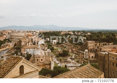 Panoramic view of city Rome with Roman forum and Colosseum from Vittoriano Panoramic view of city Rome with Roman forum and Colosseum from Vittoriano 72103776
