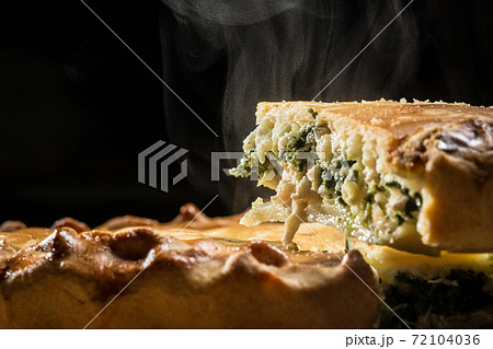 Pie with spinach and feta cheese, food 72104036