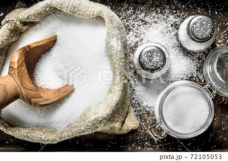 Salt in an old bag on a tray. 72105053