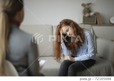 Child Psychologist. Worried sad teen girl having session with doctor Child Psychologist. Worried sad teen girl having session with doctor 72105098