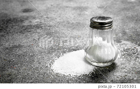 Salt in glass. Salt in glass. 72105301