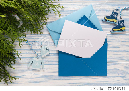 Empty Christmas card, gifts and fir branches. Mockup for seasonal greetings. Empty Christmas card, gifts and fir branches. Mockup for seasonal greetings. 72106351