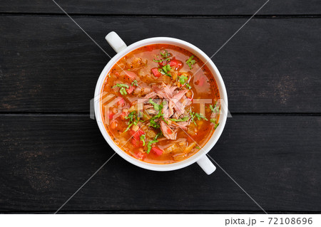 Top view of thick, spicy and sour soup with beef Top view of thick, spicy and sour soup with beef 72108696