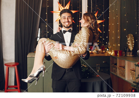 Multi racial couple celebrate new year Multi racial couple celebrate new year 72109938