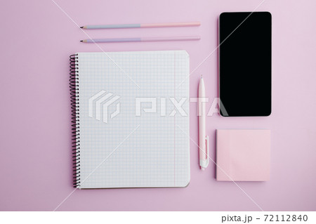 Woman workplace. Home office on pink background Woman workplace. Home office on pink background 72112840