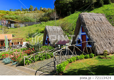 SANTANA, MADEIRA, PORTUGAL Traditional Madeira building with thatched roof. 72113424