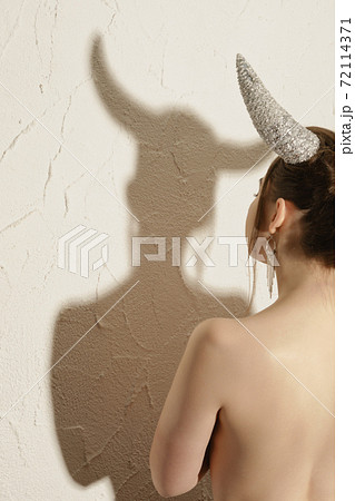 woman with horns 72114371