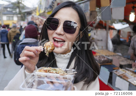 Takoyaki japanese food on the street to Fushimi Inari shrine at Kyoto,Japan. Takoyaki japanese food on the street to Fushimi Inari shrine at Kyoto,Japan. 72116006