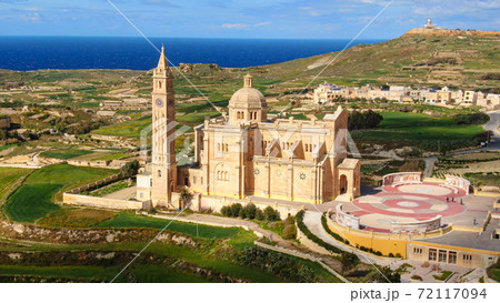 Aerial view over Basilica Ta Pinu in Gozo - a national shrine Aerial view over Basilica Ta Pinu in Gozo - a national shrine 72117094