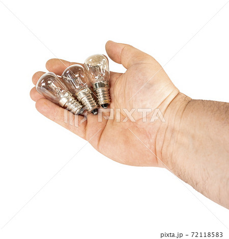 Burnt out light bulb in hand. Isolated image on white background 72118583