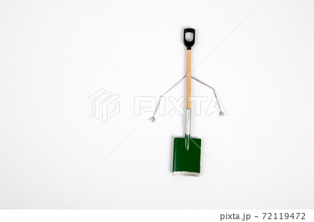 Miniature garden shovel. hobby, work and gardening concept. Free space for text Miniature garden shovel. hobby, work and gardening concept. Free space for text 72119472