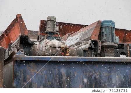 Moving conveyor transporter on Modern waste recycling processing plant. Separate and sorting garbage collection. Business for sorting and processing of waste. Moving conveyor transporter on Modern waste recycling processing plant. Separate and sorting garbage collection. Business for sorting and processing of waste. 72123731