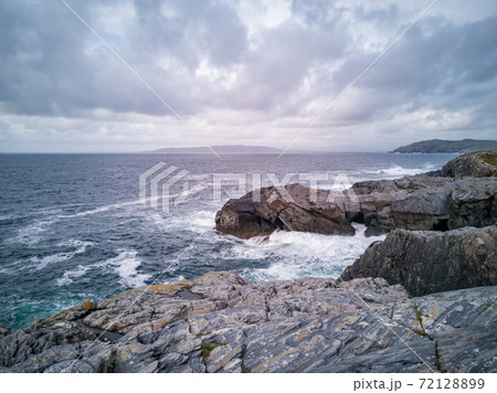 Dramatic sky above the coastline at Dawros in County Donegal - Ireland Dramatic sky above the coastline at Dawros in County Donegal - Ireland 72128899