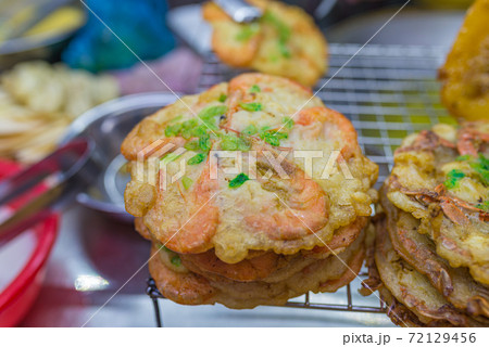 Deep fried prawn pancake with scallion, Hoi An street food Deep fried prawn pancake with scallion, Hoi An street food 72129456