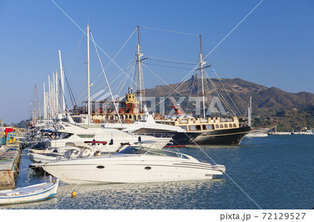 Boats and yachts are moored port of Zakynthos 72129527