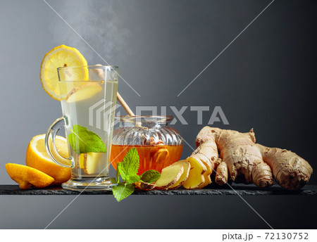 Healthy ginger tea with lemon, mint and honey. Healthy ginger tea with lemon, mint and honey. 72130752