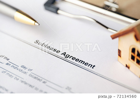 Legal document Sublease Agreement on paper close up. 72134560