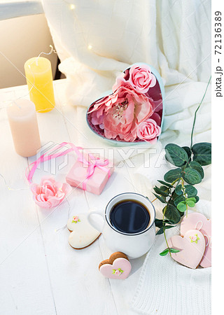 Valentine's day romantic breakfast wuth gingerbread Heart with icing and cup of coffe 72136389