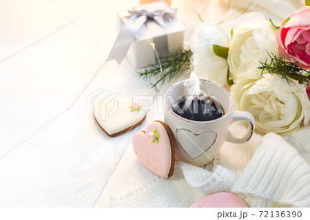 Valentine's day romantic breakfast wuth gingerbread Heart with icing and cup of coffe 72136390