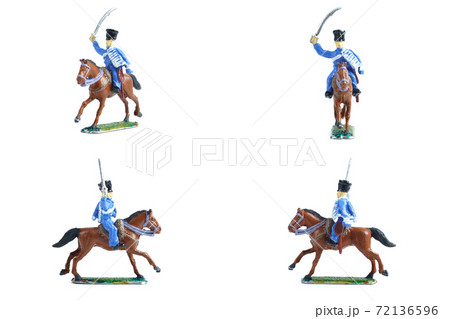 4 in 1 shot of handmade tin soldier with horse on the white background 4 in 1 shot of handmade tin soldier with horse on the white background 72136596