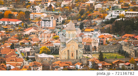 Mtskheta Georgia. Top Rooftop View Of Ancient Town And Svetitskhoveli Cathedral During Autumn Day. UNESCO World Heritage Site Mtskheta Georgia. Top Rooftop View Of Ancient Town And Svetitskhoveli Cathedral During Autumn Day. UNESCO World Heritage Site 72136782