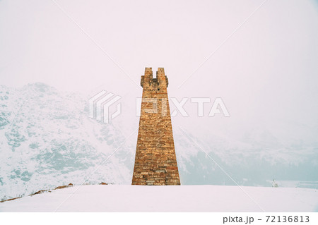 Sioni, Mtskheta-Mtianeti Region, Georgia. Ancient Old Stone Watchtower On Mountain Village. Winter Season. Famous Landmark And Places In Kazbegi District. 72136813