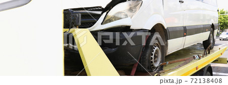 Broken hood of car that stands on tow truck. Broken hood of car that stands on tow truck. 72138408