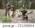 Old Man is Aiming Excited Young Hunters Watching. 72138904