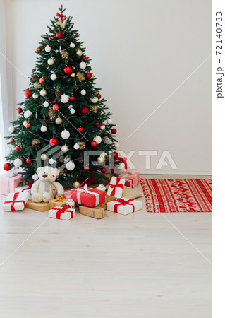beautiful Christmas tree interior with new year decor gifts beautiful Christmas tree interior with new year decor gifts 72140733