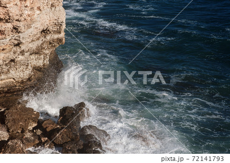 Ocean wave background breaking sea water rocky shore Ocean wave background breaking sea water rocky shore 72141793