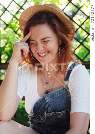 Happy young redhaired woman portrait, summer outdoors Happy young redhaired woman portrait, summer outdoors 72142277