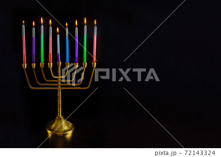 Hebrew Menorah of Hanukkah with burning candles is traditional symbol for holiday Jewish 72143324