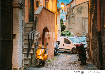 Terracina, Italy. Motor Scooter Motorbike Motorcycle Bike Parked In Narrow Old Italian Street 72143628