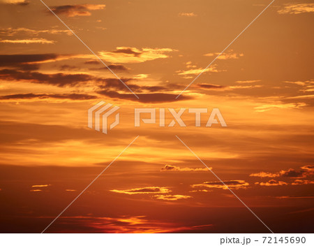 background - bright orange sunset sky with clouds 72145690