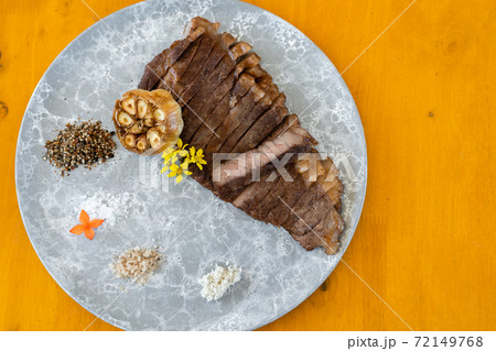 wagyu beef well done steak in plate 72149768