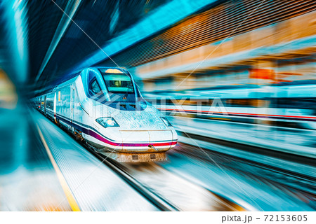 Modern hi-speed passenger train, in  movement (motion). 72153605
