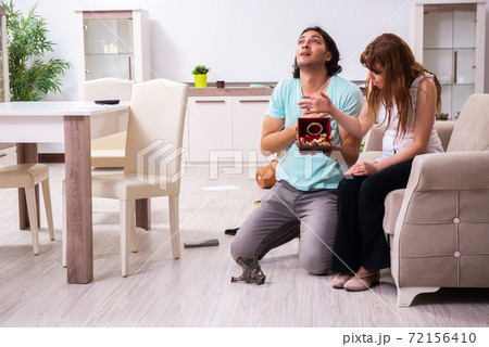 Young couple found their house after burglary robbed by burglars 72156410