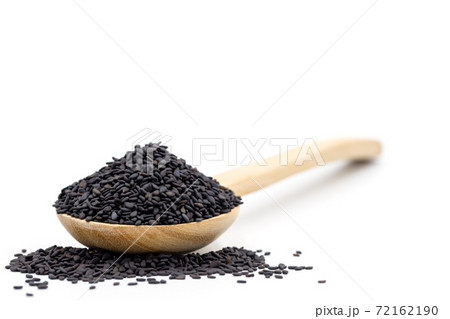 Black sesame seed in wooden spoon and piles sesame seeds on white background. 72162190