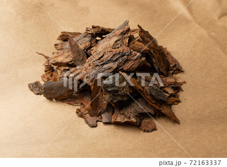 Heap of Pine Tree Bark Chip on Old Paper Background 72163337