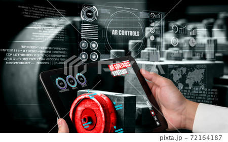 Engineer use augmented reality software in smart factory production line 72164187